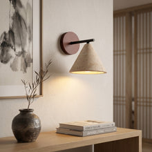 Load image into Gallery viewer, Modern wall lamp on a wooden table with books and a vase in a room setting.