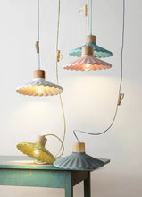 Load image into Gallery viewer, Colorful pendant lights on a table against a light background