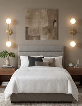 Load image into Gallery viewer, Modern bedroom with a bed, nightstands, and wall art.