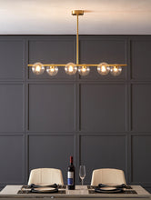 Load image into Gallery viewer, Clear glass six bulb light fixture for modern interiors