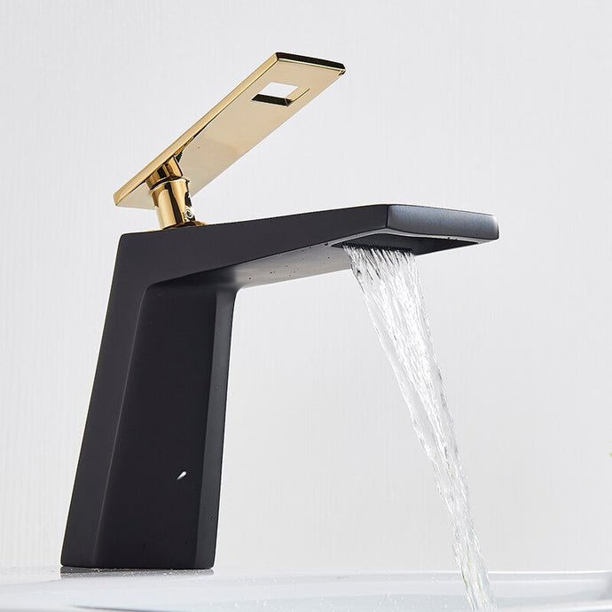 Modern matte black and polished gold bathroom faucet