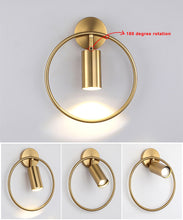 Load image into Gallery viewer, 180 Degree swivel spotlight wall sconce in brass finish
