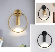 Load image into Gallery viewer, Modern circular wall sconce in 3 finish options
