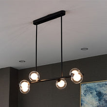 Load image into Gallery viewer, Contemporary 6 bulb clear glass globe horizontal chandelier with black hardware
